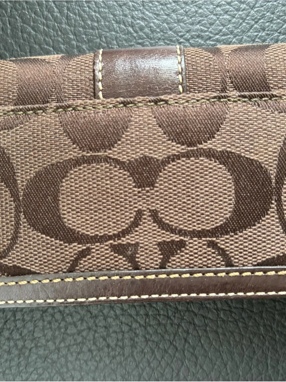 Coach stitching backpack visible